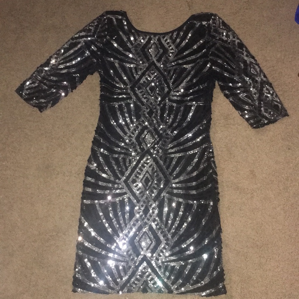 Semi formal sequined dress.